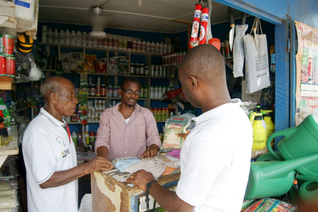 agrodealer speaking with farmers