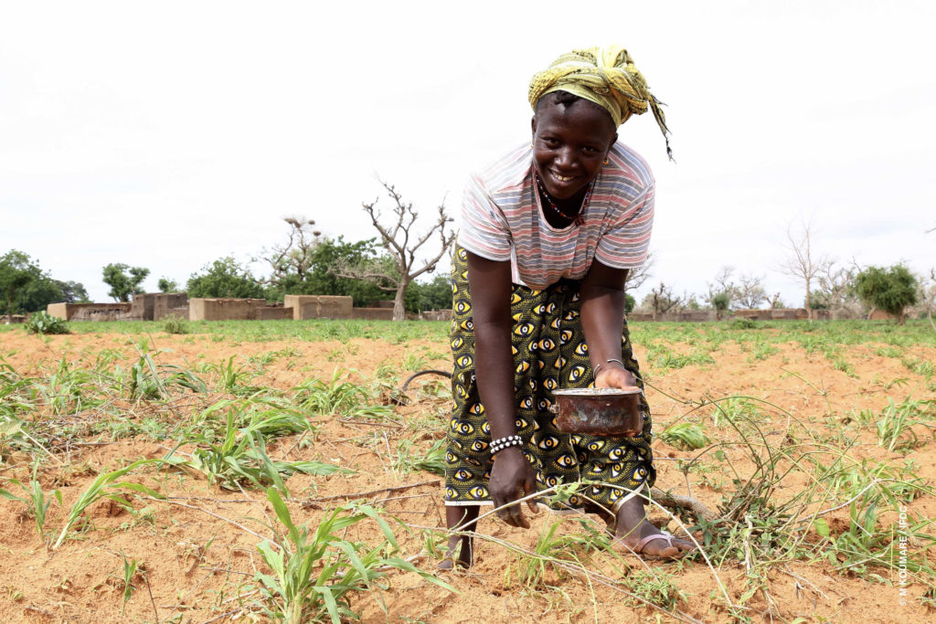 Woman with fertilizer