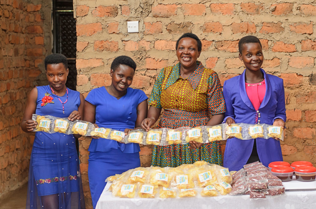 Women Presenting Potato Chips