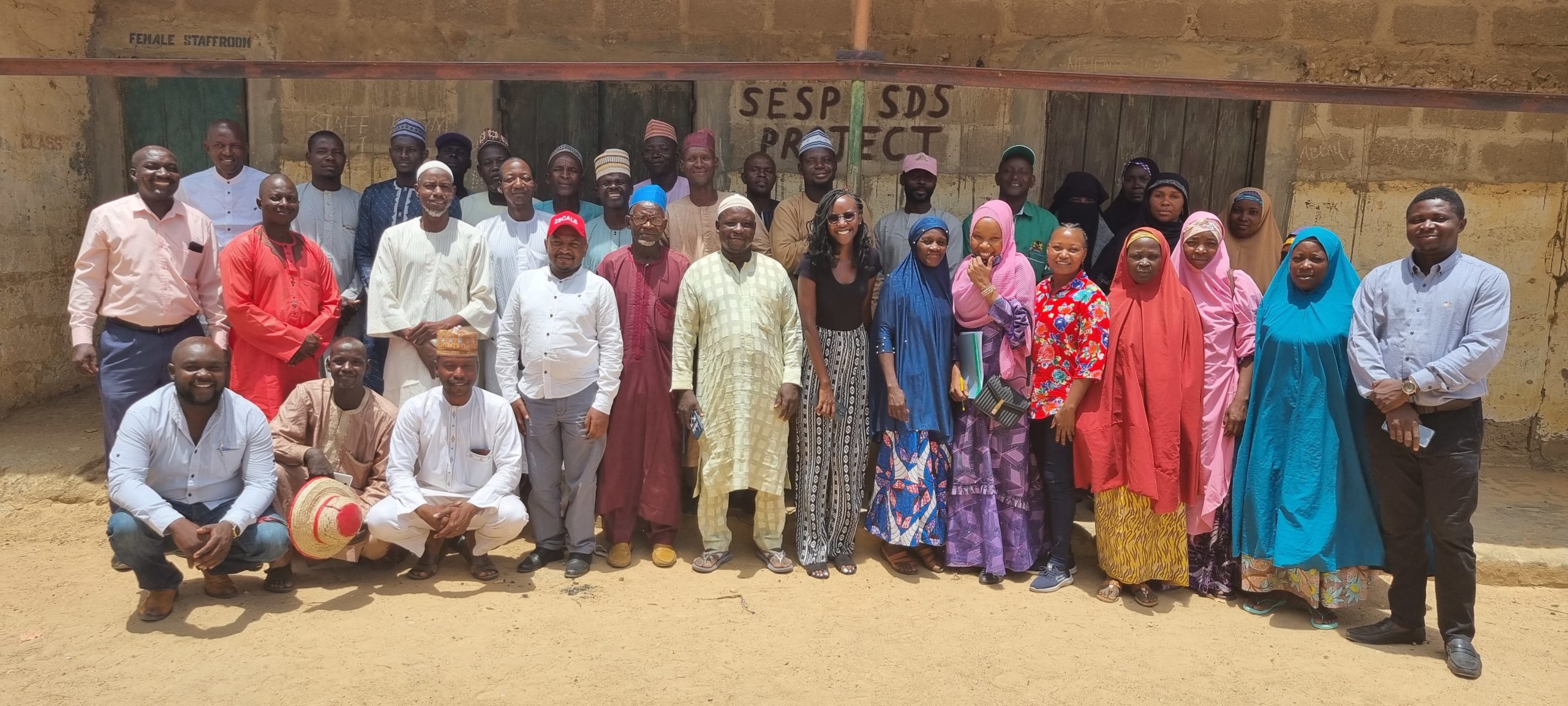 Tegemeo group poses with 2SCALE staff and partners during their visit
