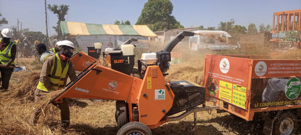 plant materials are loaded into a machine for composting