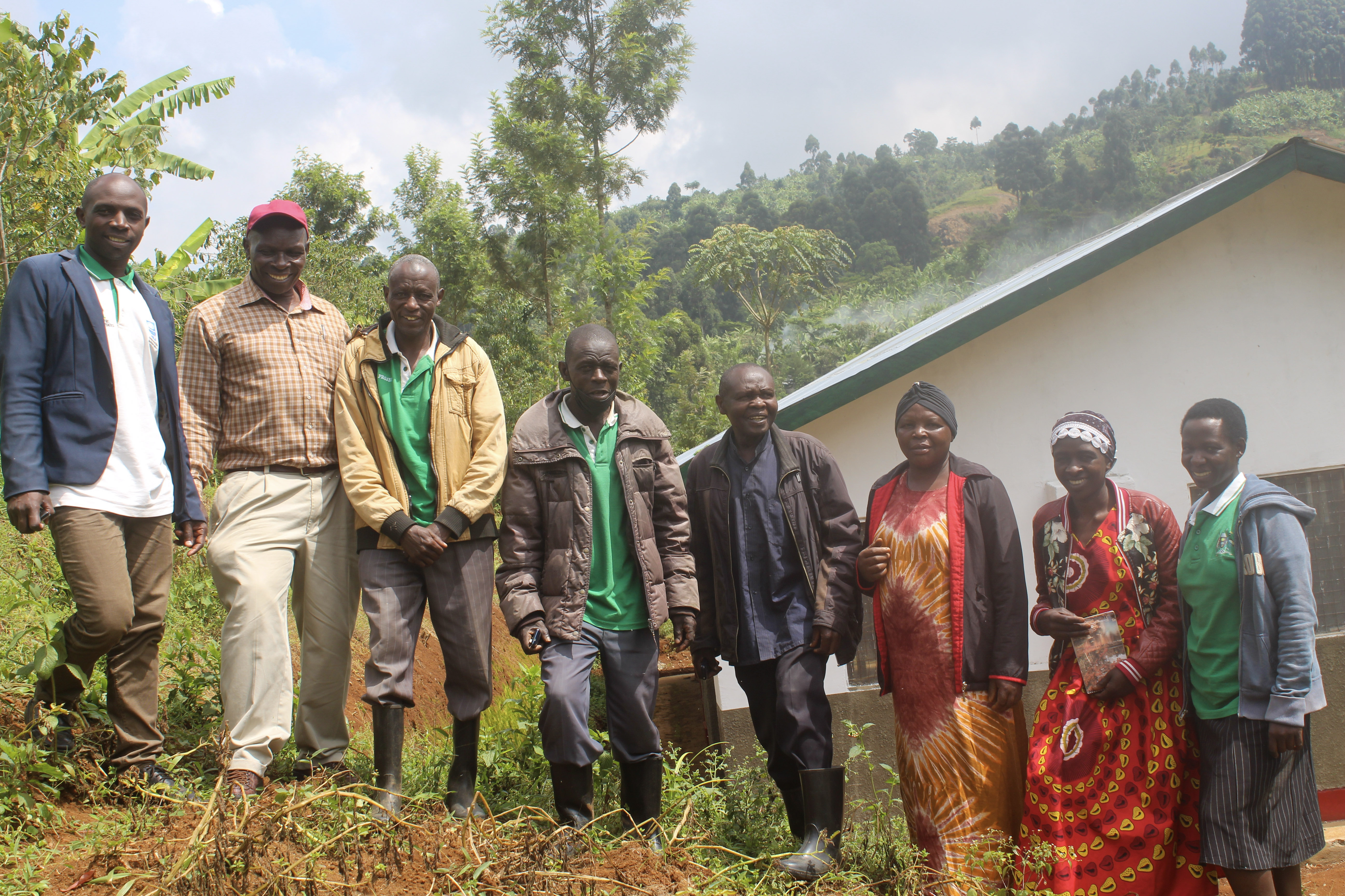 Members of the Wanale Seed and Ware Potato Farmers Association (WASWAPA) stand in front of their new office.