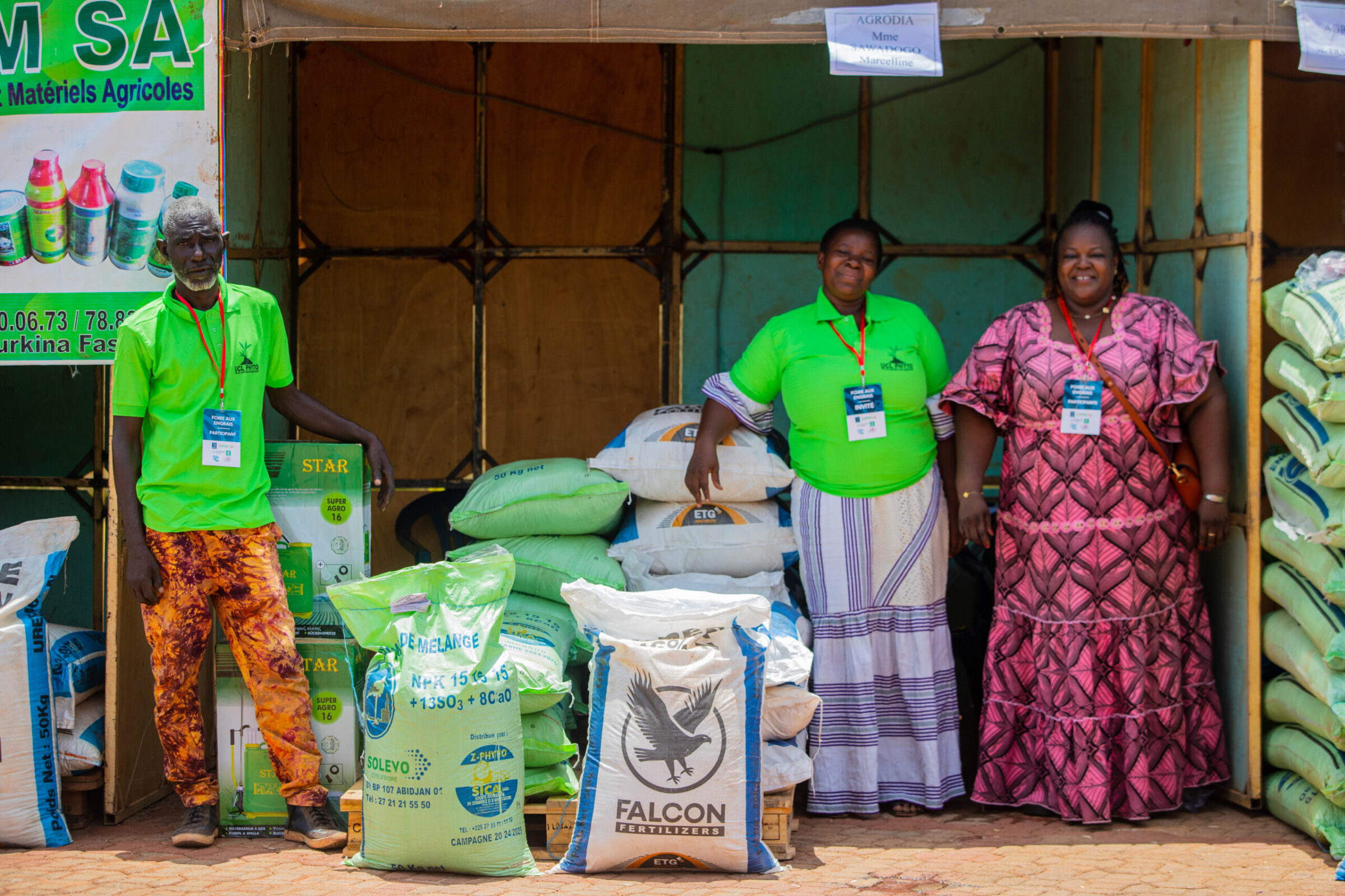 Local farmers set up to market their agricultural inputs during an event.