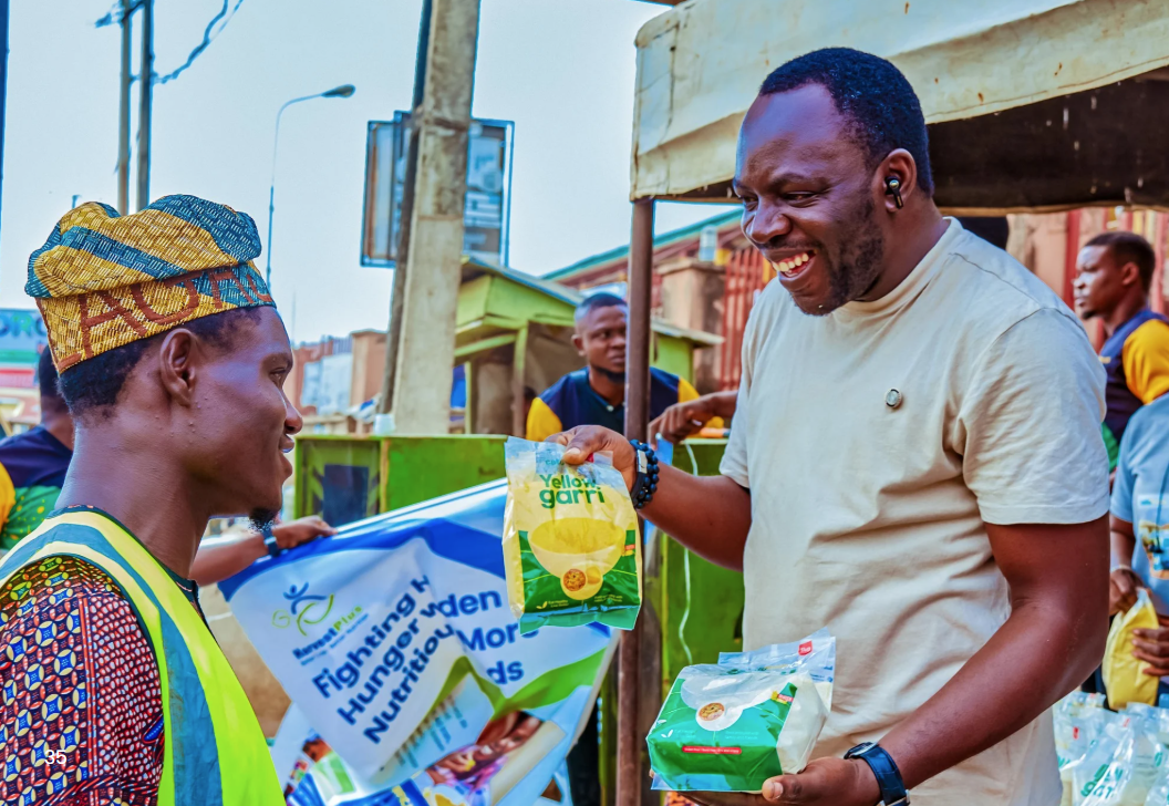 Man selling products at a market.