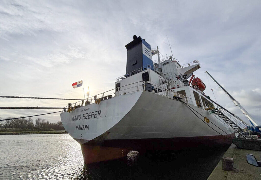 A shipment of fertilizers and seeds being carried by boat.