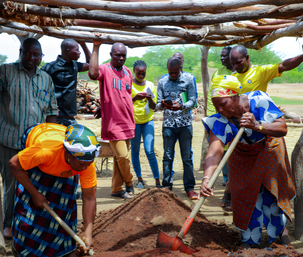 Two female farmers participate in nutrient management training.
