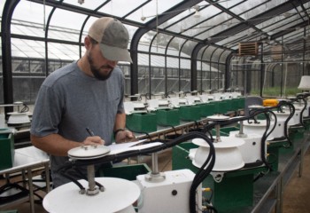 Researchers at IFDC measure greenhouse gas emissions using specialized equipment in greenhouse facilities at its headquarters in Muscle Shoals, AL.