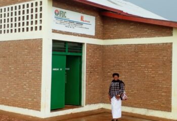 Felaide Irumva, president of the Tuduzumwimbu Nyamugari Cooperative, credits IFDC and PSSD2 support with improving seed storage, expanding activities, and boosting members’ incomes.